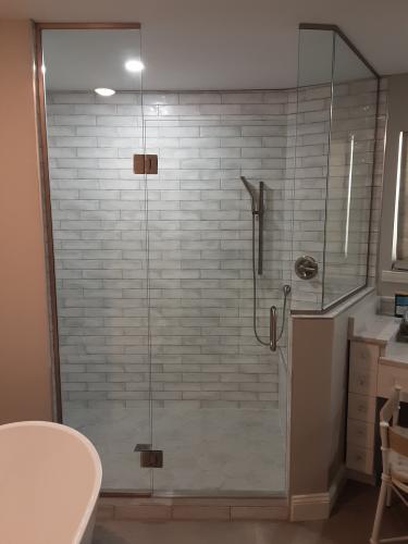 Beautiful Custome Shower with brush nickel hardware. 