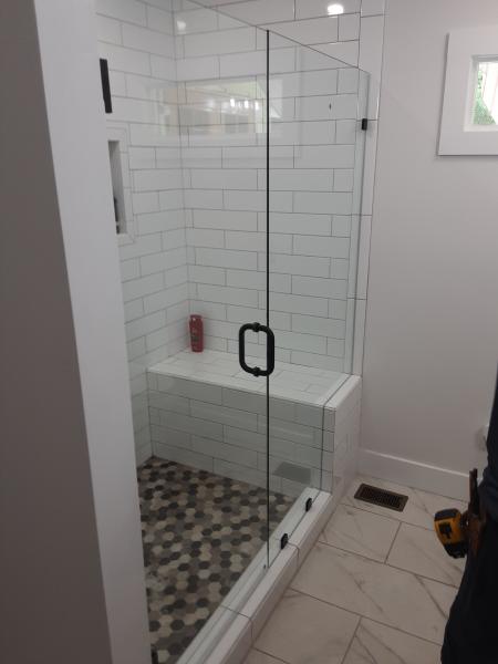 Custome size shower with matte black hardware.